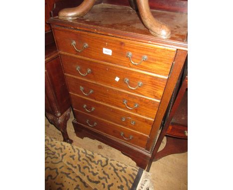 Late 19th / early 20th Century mahogany safe cabinet having galleried top with single door simulated as drawers, on a plinth 