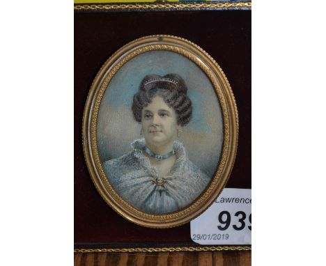 Late 19th or early 20th Century watercolour portrait miniature on ivory of a lady wearing a lace shawl