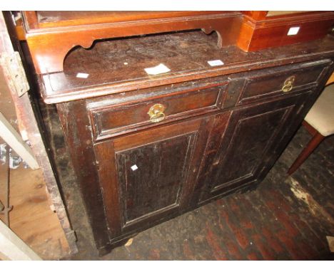 Antique oak side cabinet / dresser, the associated boarded shelf and cupboard back above a single moulded front drawer and a 