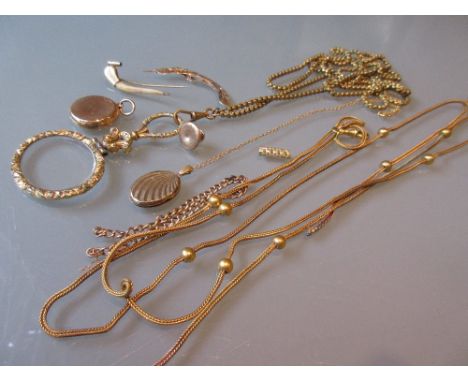 Gold plated quizzing glass on a plated guard chain together with another gilt metal guard chain (at fault), a compass fob, go