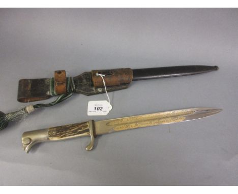 Mid 20th Century German or Austrian bayonet with solingen steel blade and gilded inscription, the antler faced grip with rifl