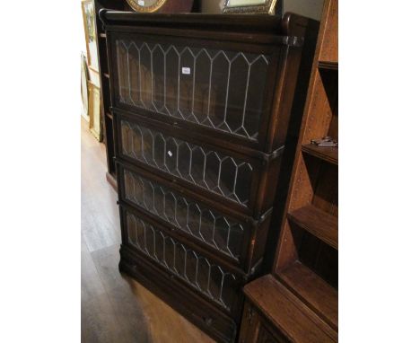 Globe Wernicke oak five section bookcase having leaded doors CONDITION REPORT The item does not have woodworm. The edges are 