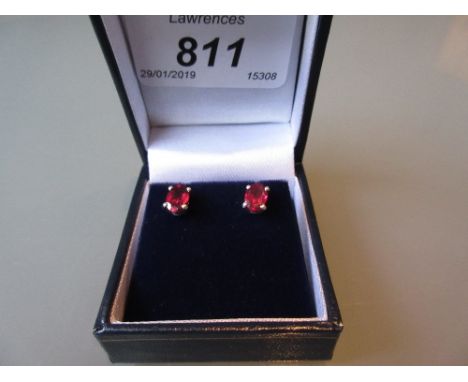 Pair of treated ruby stud earrings