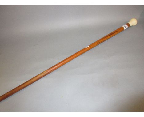 Gentleman's 19th Century Malacca walking cane, the ivory grip inset with a compass (at fault)