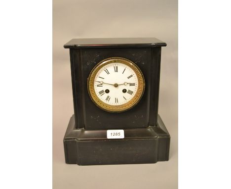 Small black slate two train mantel clock with pendulum