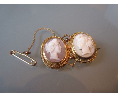 19th Century yellow metal mounted double carved shell cameo portrait brooch