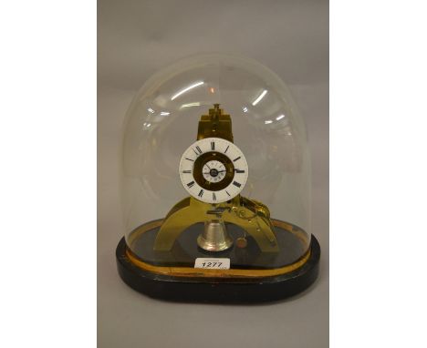 Small French brass skeleton clock with alarm, the white enamel chapter ring enclosing a central alarm dial on arched supports