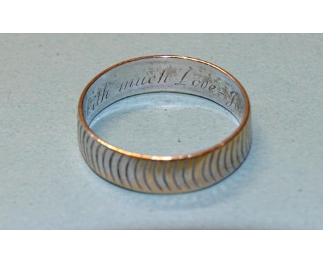 A rhodium-plated 22ct gold wedding band, size R, 4g. 