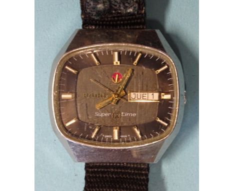 Rado, a gent's Super Time day/date wrist watch, the black dial with baton numerals and Spanish/English days, in steel case, (