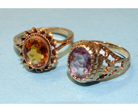 A 9ct gold ring set citrine, size K½ and another set amethyst, size I, 5.1g, (2). 