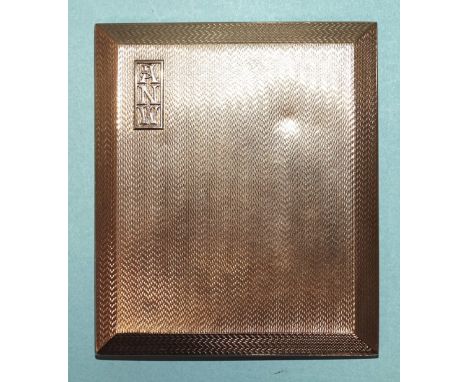 A 9ct gold cigarette case with engine turned decoration, applied initials&nbsp;ANW and sliding catch, engraved inscription in