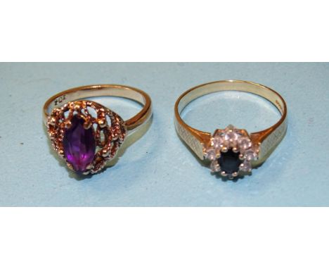 A 9ct gold ring set amethyst, size N½, 3.1g and another set sapphire and synthetic white stone cluster, size R, 2.1g, (2). 