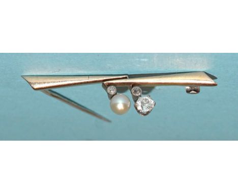 An Edwardian bar brooch obliquely-set an old brilliant-cut diamond and a cultured pearl, each beneath a small 8/8-cut diamond