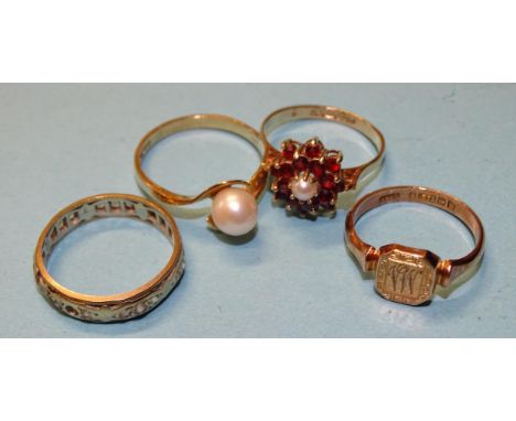 A 9ct gold signet ring, 2.8g, a 9ct gold garnet and pearl cluster ring, size N, 2.2g and two other 9ct gold rings, total weig