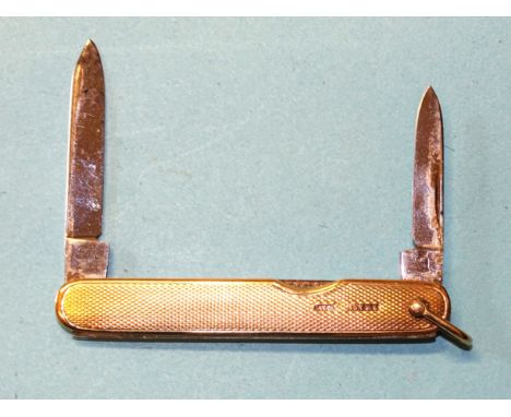 An engine turned 9ct gold penknife by Sampson Mordan &amp; Co, London 1930, 72mm including bale, 18g.