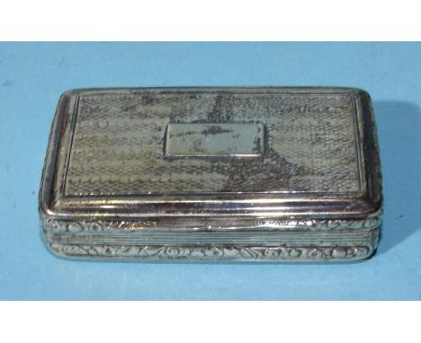 A George III silver snuff box of rectangular form, the lid and base with engine turning and floral decorated borders with gil