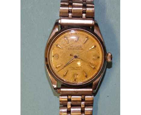 A Rolex Oyster Perpetual Officially Certified Chronometer stainless steel wrist watch c1940, the gold honeycomb 28mm dial wit