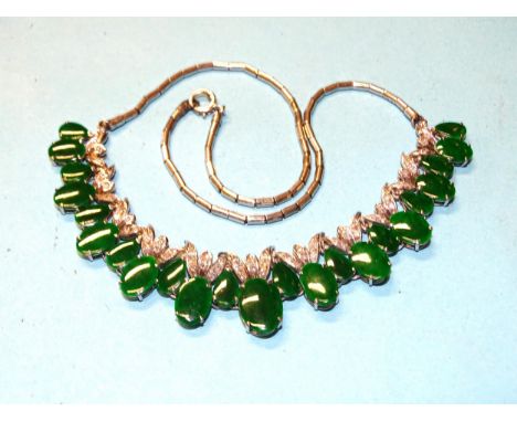 A diamond and jade necklace claw-set twenty-three teardrop jade cabochons, with 8/8-cut diamonds, marked '14k', 19g, (boxed).