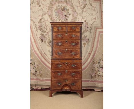 A GEORGE I STYLE WALNUT AND CROSSBANDED CHEST ON CHEST the upper section with a moulded cornice over two short and three long