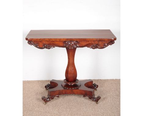A VICTORIAN MAHOGANY CONSOLE TABLEon central column base with turned feet, 75cm high x 91cm wide