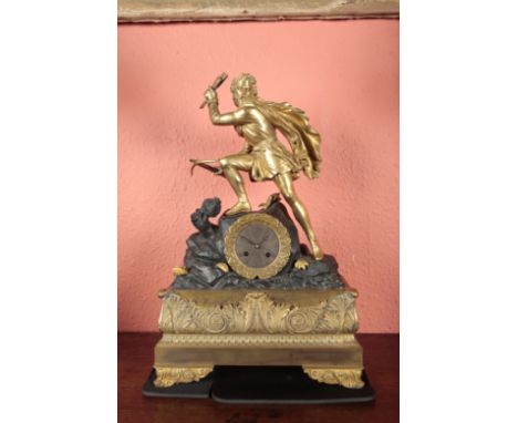 A FRENCH GILT METAL MANTEL CLOCK BY ELIE A PARIS early 19th century, the eight day movement striking on a bell, the silvered 