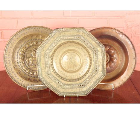 FOUR ALMS PLATES OR CHARGERS17th century and later, the first octagonal with cavalier wearing plumed hat to the centre, 41cm 