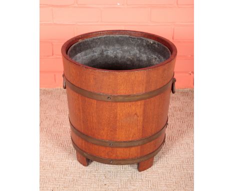 AN EDWARDIAN TEAK AND BRASS BOUND PLANTER STAMPED LISTER with makers marks, serial number '40054' and initials 'J.J.' impress