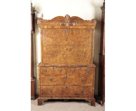 A BURR AND FIGURED WALNUT ESCRITOIREcirca 1720, with fitted interior of drawers and pigeonholes, the lower section with two s