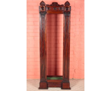 A WILLIAM IV MAHOGANY LEAF RACK IN THE GRECIAN TASTEof architectural design with half-columns to each side and shaped pedimen