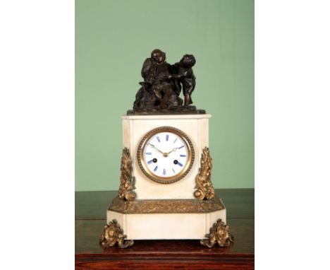 A FRENCH MARBLE MANTEL CLOCKthe two train movement striking on a bell, the enamel dial with blue Roman numerals, the case mou