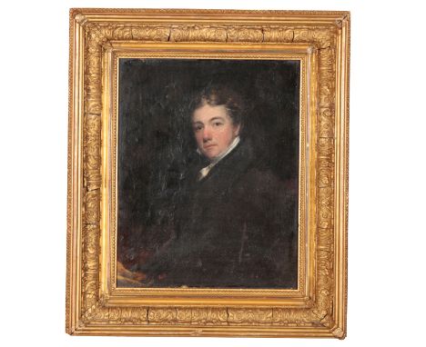 ENGLISH SCHOOL, 19TH CENTURY A portrait of a gentleman depicted half-length, wearing a black overcoat and white stock, holdin