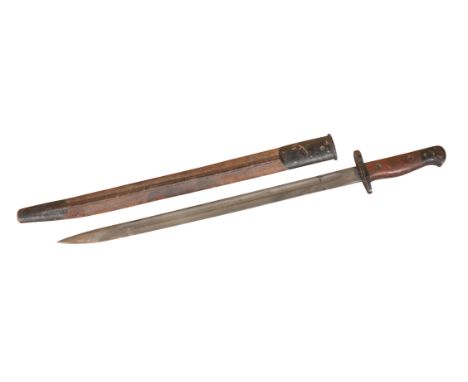 A WWII BRITISH BAYONETstamped to blade "1907", with the original leather scabbard, 57cm longNote: You must be over 18 to purc