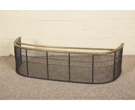A VICTORIAN BRASS FENDER late 19th century, with lattice surround, 20cm high x 77cm wide x 25cm deep