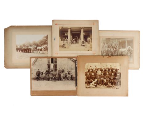 Scottish Hunting Party Photographs, Albumen print showing a Scottish hunting party with mounted stags heads, guns, fishing ro