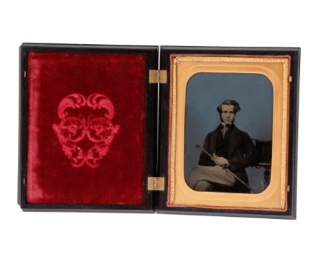 Fine Coloured Ambrotype in Peck and Halvorson Union Case, Ambrotype showing a well dressed gentleman with cane and top hat in