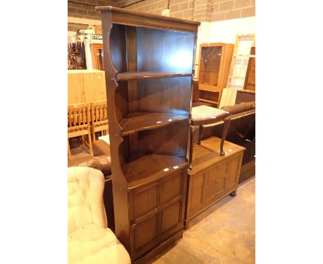 Ercol corner shelves with cupboard below