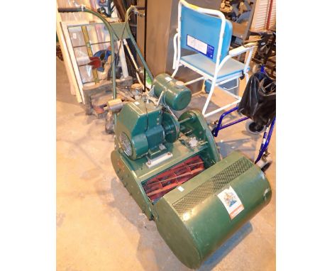 Ransons cylinder lawn mower with 20" cut and kick start petrol engine  CONDITION REPORT: Appears to be in good though used co