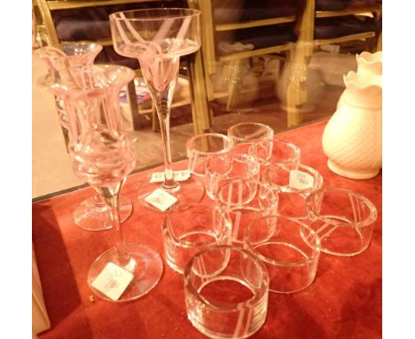 Set of ten Caithness crystal napkin rings and three Caithness candle holders 