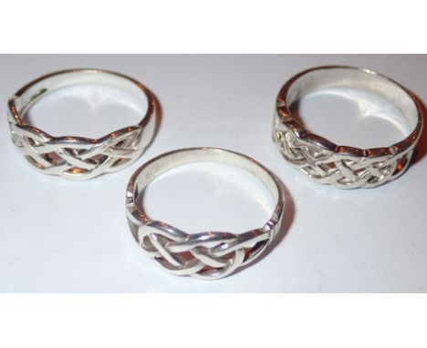 Three silver Celtic rings size P and Q