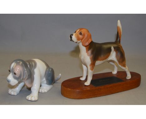 A Beswick Connoisseur Beagle figure together with a Lladro dog figure (2)