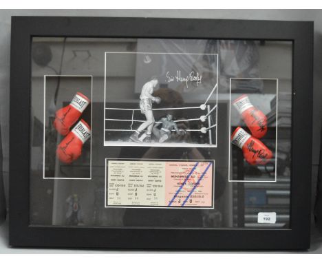 A framed and glazed picture signed by boxer Henry Cooper fighting Muhammad Ali with two miniature sets of gloves, each with t