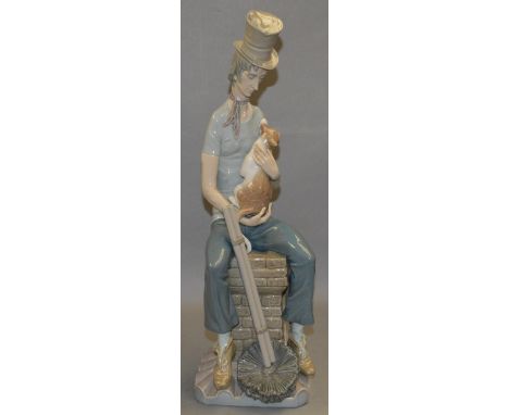 A Lladro figure of a chimney sweep and a cat. 44 cm tall.