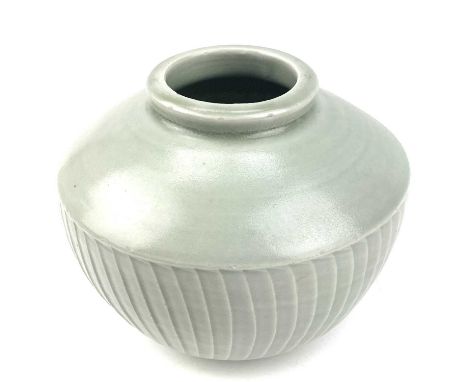 David LEACH (1911-2005)A fluted porcelain vase with celadon glazeImpressed potters sealHeight 15cmStructurally sound, with no