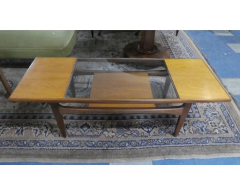 A Vintage 1970's Coffee Table with Stretcher Shelf, 137cm Long