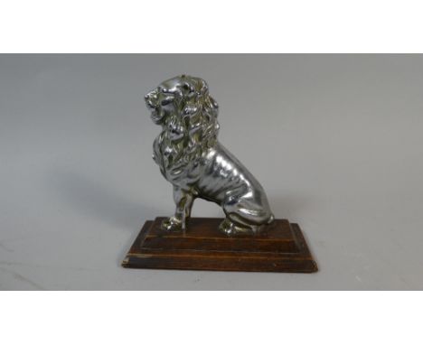 A Chromed Door Step In the Form of a Seated Lion Set on Oak Plinth, 15cm High 