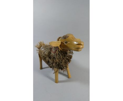 A Ceramic and Wooden Study of a Lamb, 46cm Long