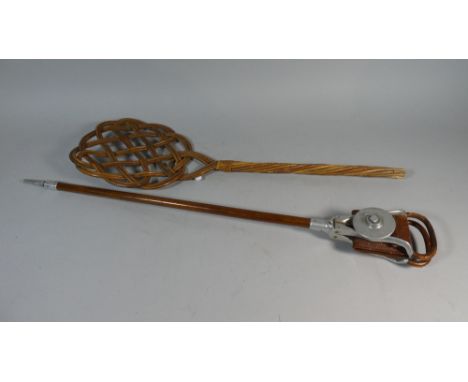 A Vintage Shooting Stick Together with a Bamboo Carpet Beater