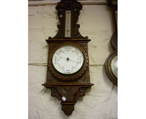 19th Century carved oak aneroid barometer