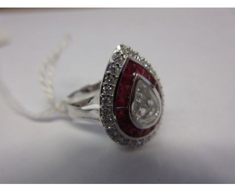 Large rose cut pear shaped diamond and ruby ring, the rubies 1.25ct and the diamonds 1.10ct total approximately