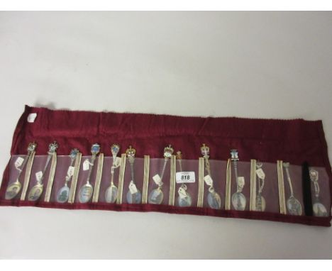 Thirteen enamel decorated spoons to include Bavarian with portrait decorated bowls